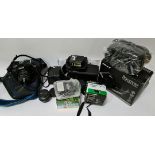 A vintage Ricoh KR-10 Super camera with Vivitar lense, in soft camera camy case, together with a