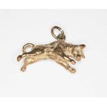 A hallmarked 9ct gold charm modelled as a raging bull, wt. 7.3g.