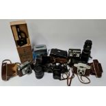 A collection of miscellaneous cameras and other items including Kodak Bantam Colorsnap 3 camera,