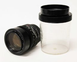 A Leitz Summicron-R 1:2/90 lens, serial no. 2627180, with plastic case.