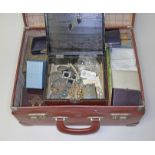 A case of mainly costume jewellery and jewellery boxes etc.