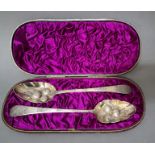 A cased set of two George III silver 'berry' spoons, one hallmarks for Alexander Spence, Edinburgh