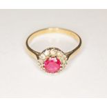 A hallmarked 9ct gold synthetic ruby and diamond ring, gross wt. 2.7g, size Q.