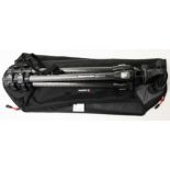 A Manfrotto 190MF3 Magfiber camera tripod with case.