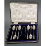A cased set of six silver spoons and tongs, hallmarked for 1920, Sheffield, Joseph Rodgers & Sons,