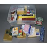 A large collection of playing cards to include vintage, etc.
