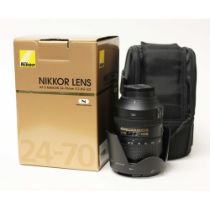 A Nikon ED AF-S Nikkor 28-300mm 1:3.5-5.6G lens, with hood, soft bag and associated box.