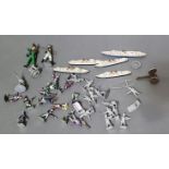 A selection of vintage lead soldiers and various items including Triang boats and miniature