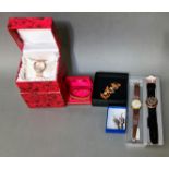 A mixed lot comprising an Atlanta 1996 Pop Swatch, a Butler Wilson brooch, other watches and