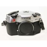A Leica R8 SLR camera body, anthracite, serial no. 2421555, with strap.