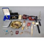 A selection of collectables including lighters such as Zippo hand warmer, pewter whistle, "