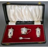 A cased silver cruet set, hallmarked for 1965, Birmingham, J R, gross weight 149.5 grams.