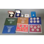 Assorted proof and uncirculated coins and coin sets including one sterling silver, virenium, Isle of