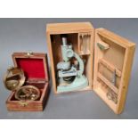 A vintage boxed Regent student microscope with few accessories and a reproduction Natural Sine brass