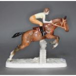 Hertwig Katzhutte Art Deco figure girl on horse jumping fence, approx 27cm in length.