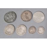 Assorted coins comprising a a Victoria 1889 crown, an 1876 5 pesetas, two two shillings and two