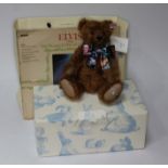 A Steiff mohair "The Elvis Bear" with box, label attached, Elvis scarf, Steiff bag, an Elvis LP