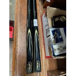 Two Riley snooker cues, both signed John Higgins.