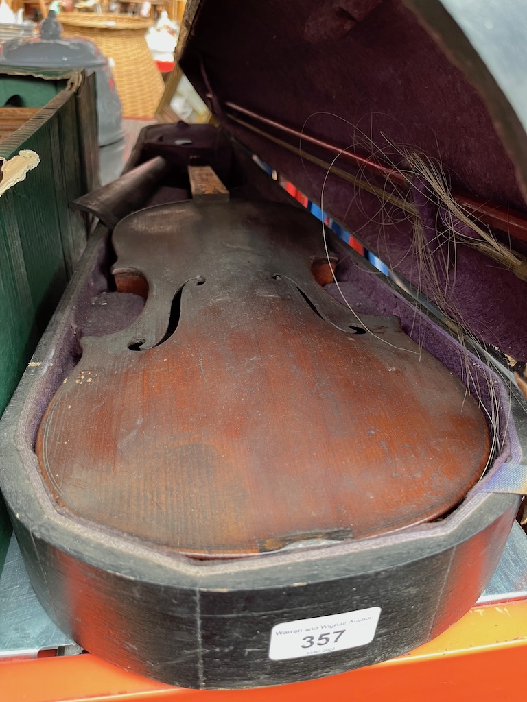 A 19th century Strad copy, one piece back length 357mm, bearing label, with bow and hard case.