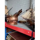 A brass warming pan, a copper coal bucket, bellows and a poker