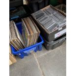 A box of shellac 78rpm records, a box of records and a box of CDs and DVDs + cases.