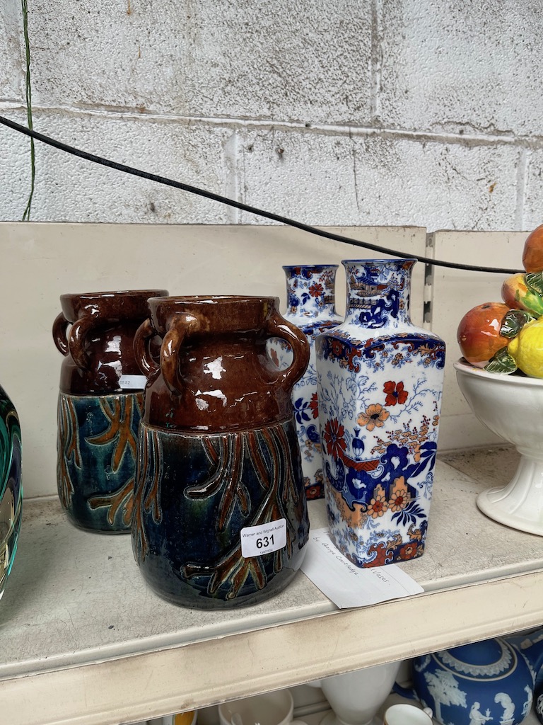 A pair of studio vases/ewers with four handles at top, and a pair of oriental style coloured vases