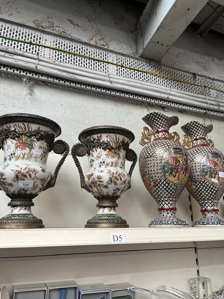 Two pairs of oriental vases/urns. Hts. 34cm and 46cm