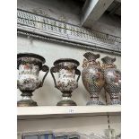 Two pairs of oriental vases/urns. Hts. 34cm and 46cm