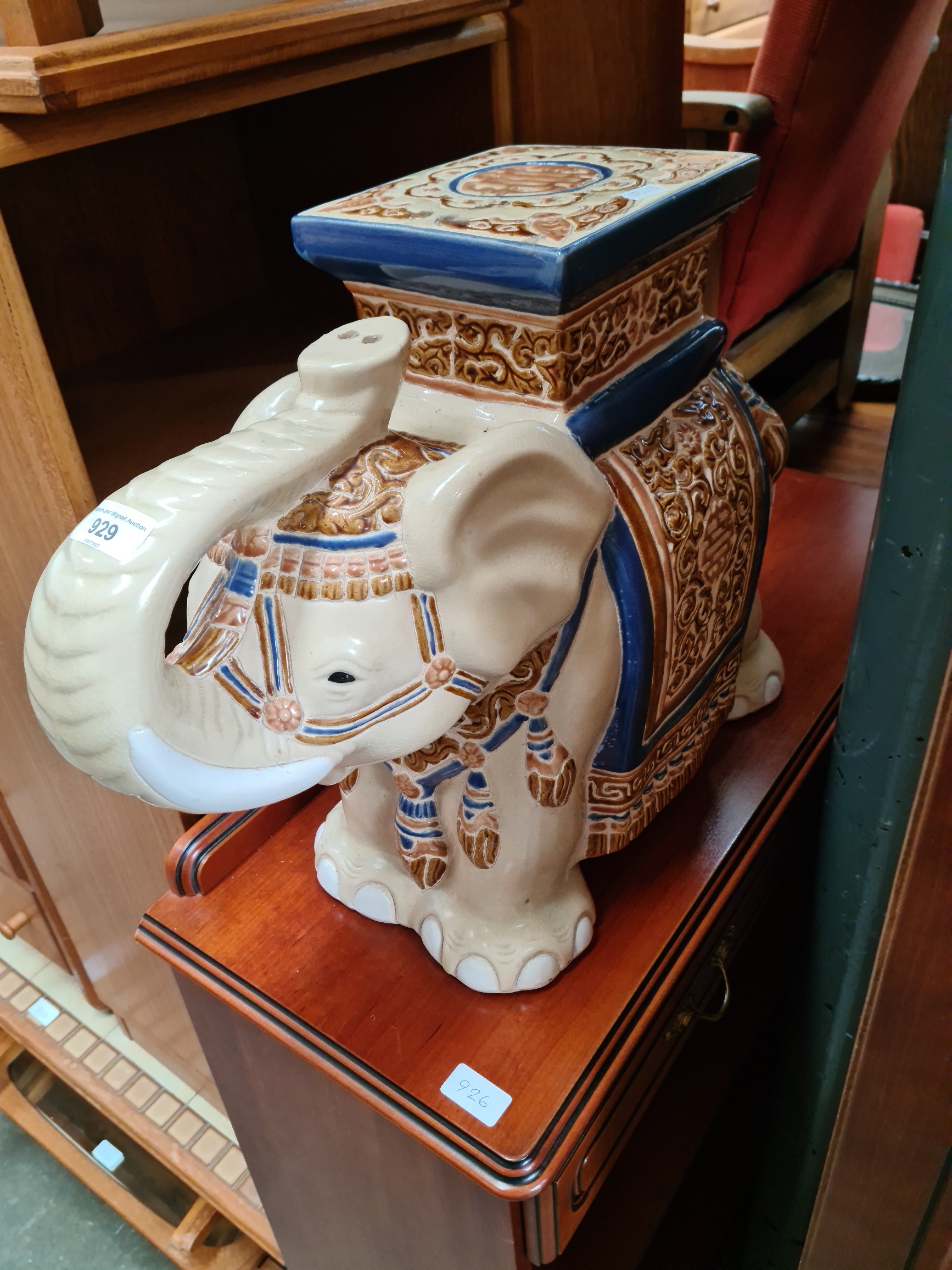 A Chinese pottery elephant plant stand.
