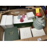 A box containing boxed figurines including Doulton Companions, Doulton Gemstone, Goebel Snowbabies