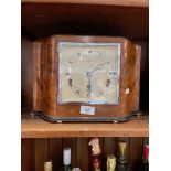 An Elliot walnut cased bracket clock.