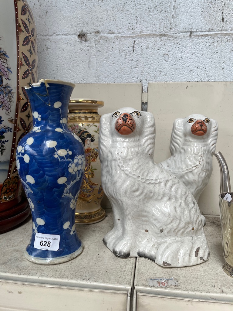 A blue and white oriental vase with 4 character marks to base, but with significant damage and