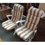 Two garden lounger chairs.