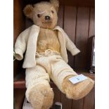 An early 20th century plush teddy bear.