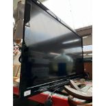 A 42" Panasonic Viera TV with remote, model number TX-L42E3B