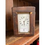 A French brass and glass carriage clock in original box with key.