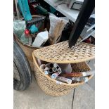 A tub of mixed garden tools including strimmer, sprayer, hose, and a tub of film posters