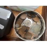 A tin of UK coins including old pennies, sixpences, threepenny bits etc