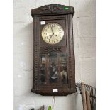 A vintage wooden wall clock