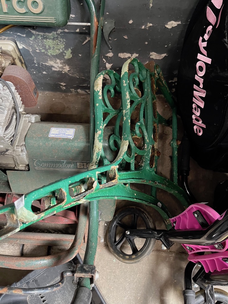 2 cast iron bench ends and a vintage lopper