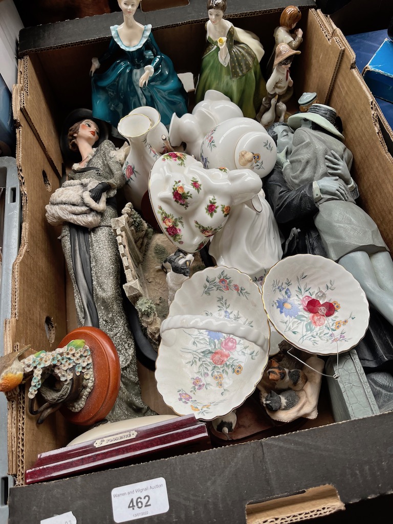 A box of ornaments including two Royal Doulton figures, Royal Albert Old Country Roses dog figure, a
