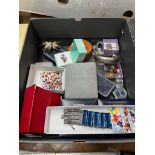 A box containing costume jewellery and watch