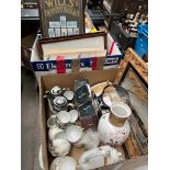 Two boxes of mixed ceramics including oriental tea set, vase, framed cigarette cards, marine