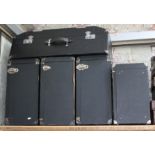 A 1920s Brexton rexine car trunk case and four other cases.