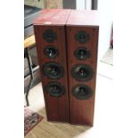 A pair of floor standing loudspeakers, unmarked, cone diameter 6".