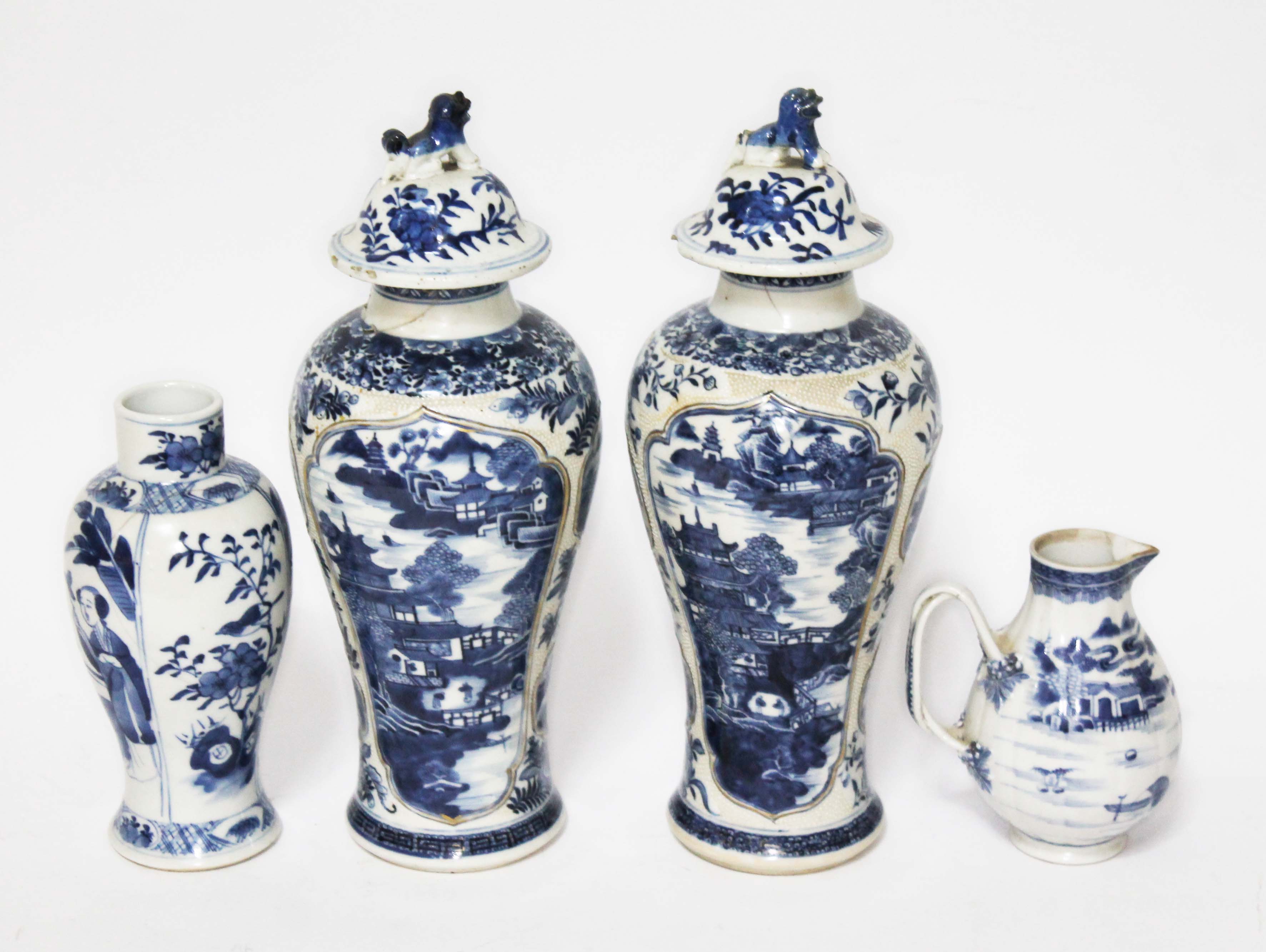 Assorted Chinese porcelain comprising a pair of baluster vases with covers, an export jug and