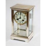 A four glass mantle clock with enamel dial, height 23cm.