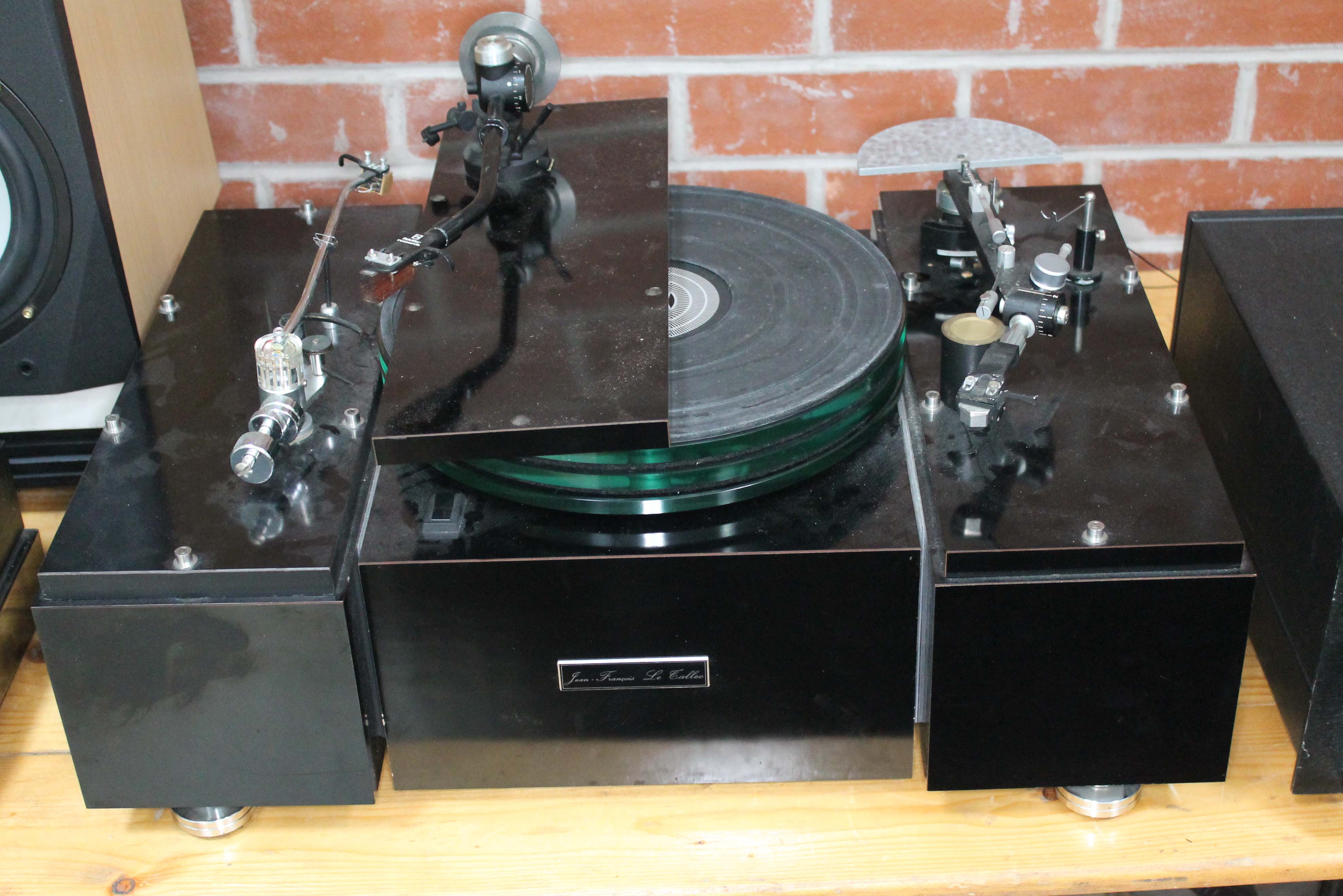 A Jean & Francois Le Tallec turntable with three tone arm boards containing a Fidelity Research FR-