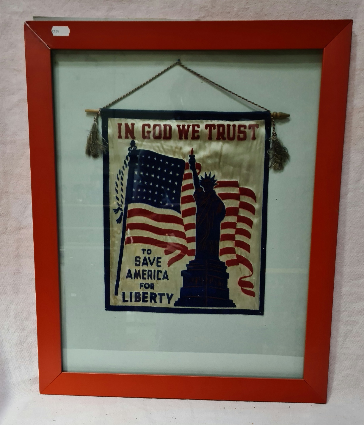 A pole banner, 'IN GOD WE TRUST' 'TO SAVE AMERICA FOR LIBERTY', framed and glazed, overall size 45.