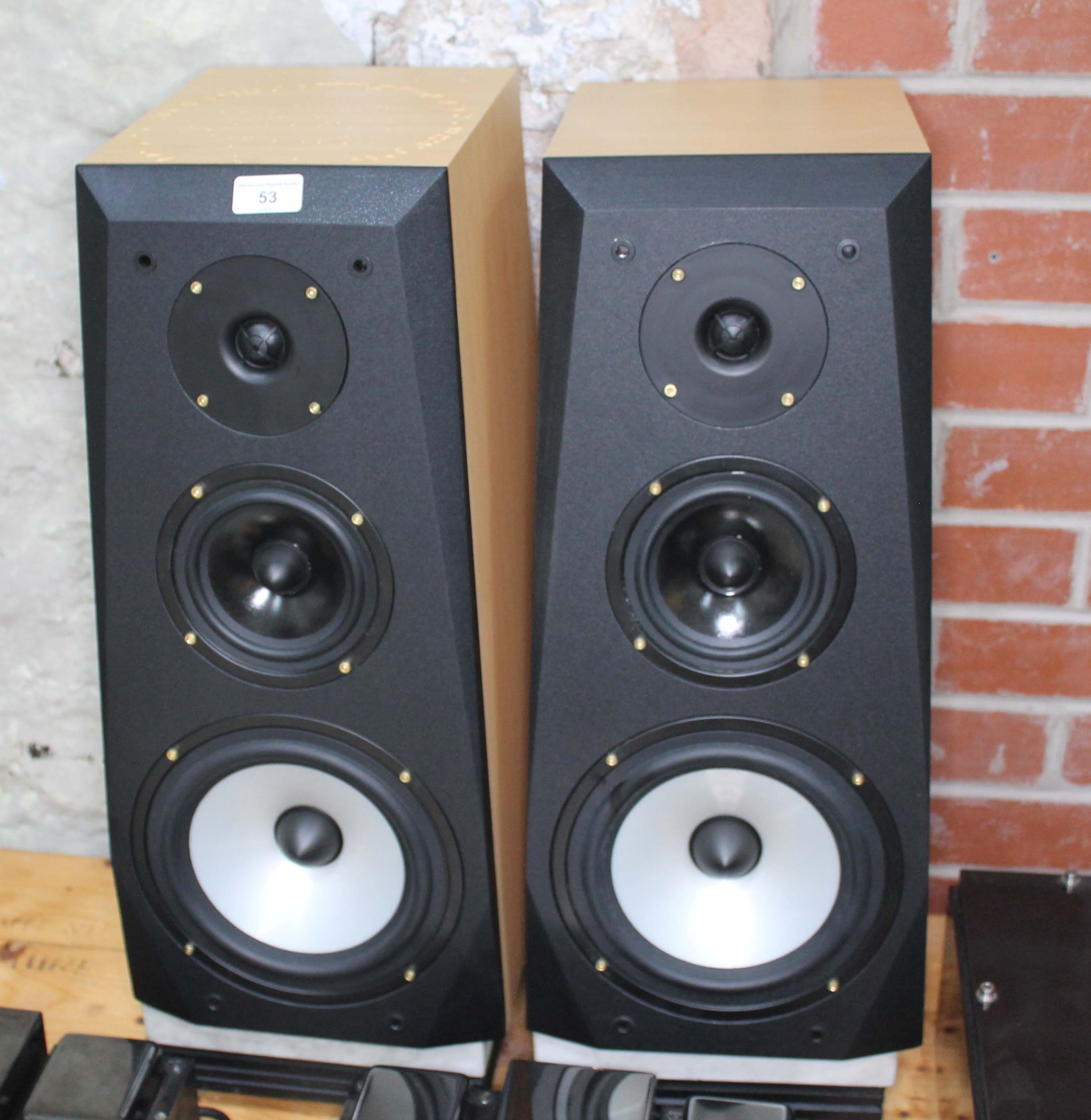 A pair of trapezoid shaped loud speakers, unmarked, 75 watt, 8 Ohms, 8" cones.